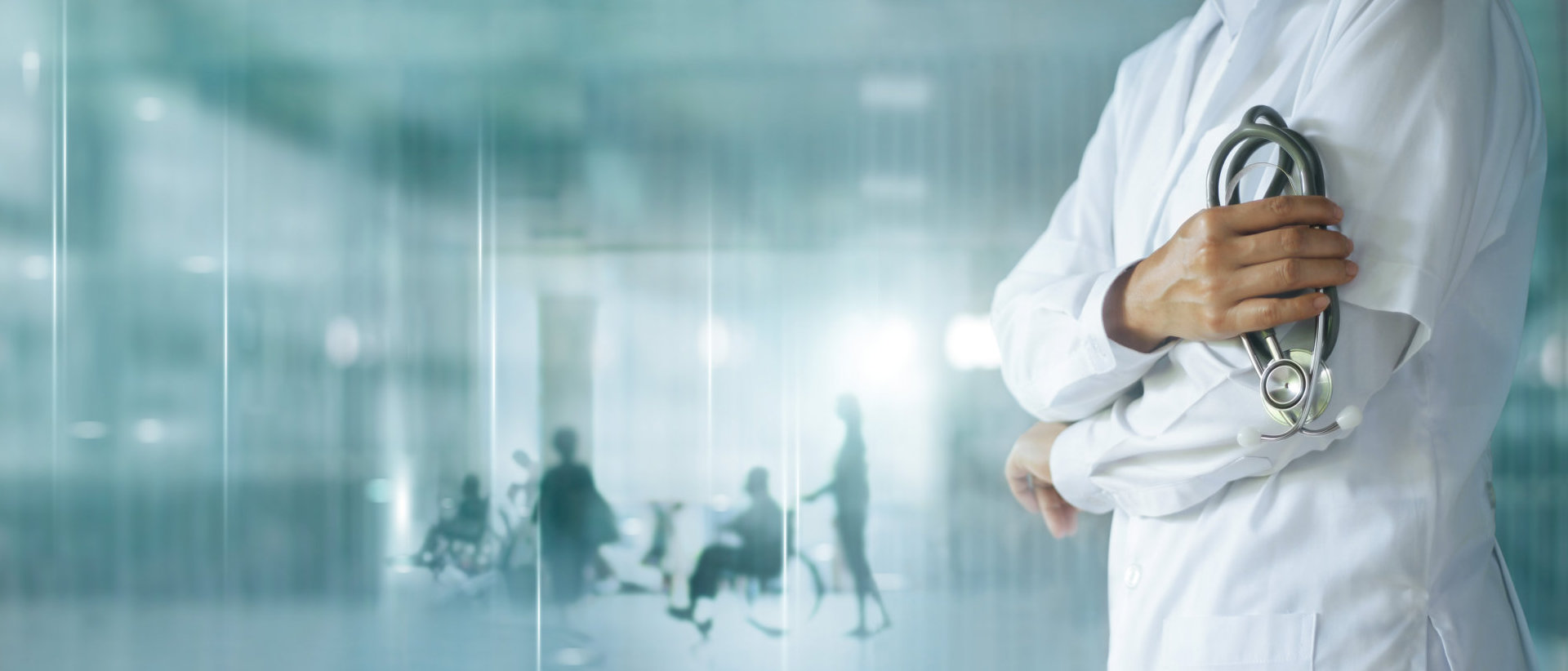 male doctor holding a stetoscope